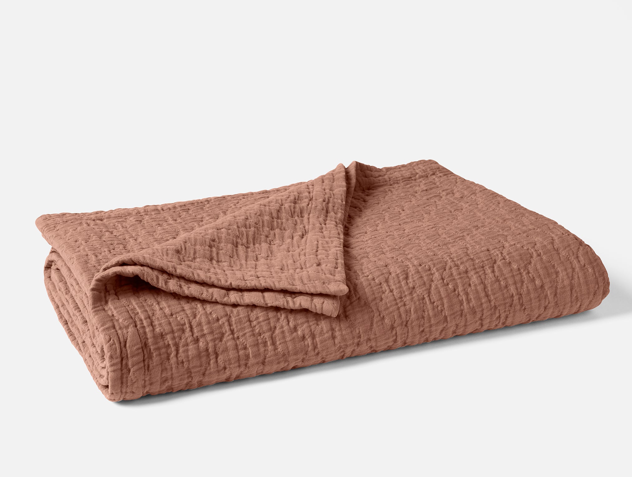 SP25_PescaderoMatelasseOrganic_Blanket_Praline_1633_b77a4d62-cd8b-4a1e-b38c-ac2050b63f68